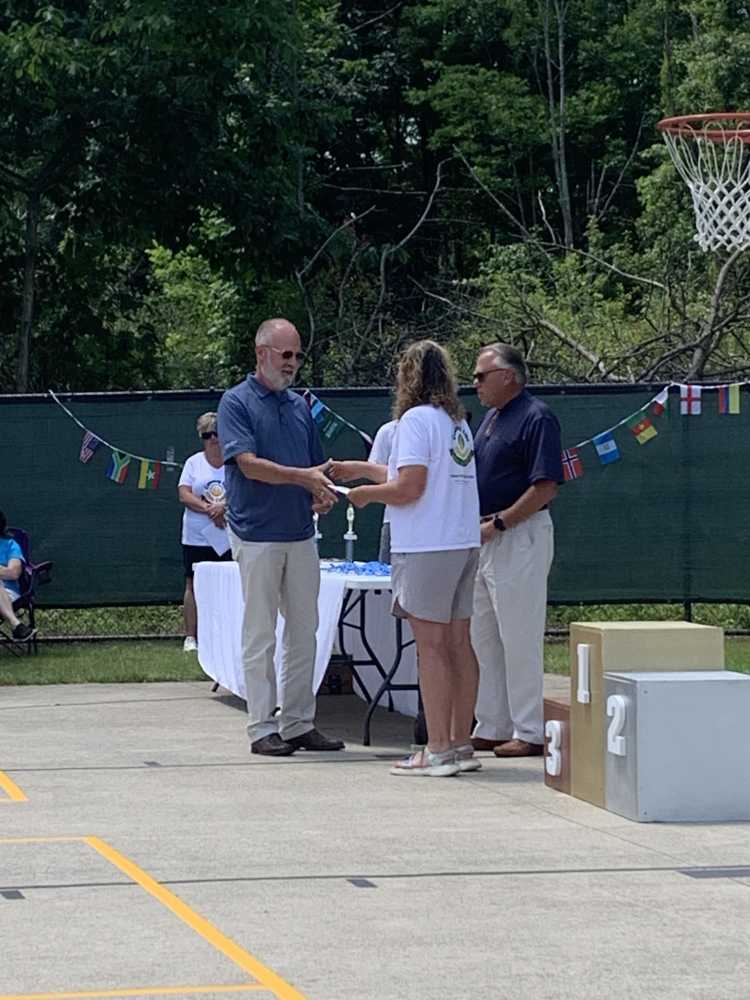 Chancellor Dan Cathcart and Deputy Grand Knight Rick Dudas present Tina Bildstein, Camp Director of Country Life Kids Camp with a Generous Gift.
