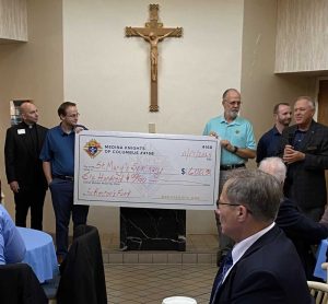 Check Presentation to Father Andy Turner at St. Mary Seminary